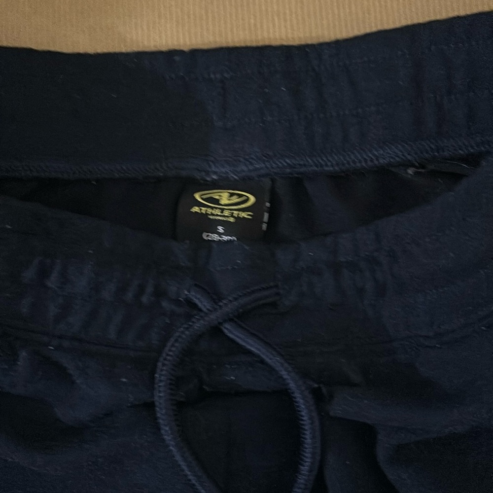 Dark blue athletic sweatpants. Size small.